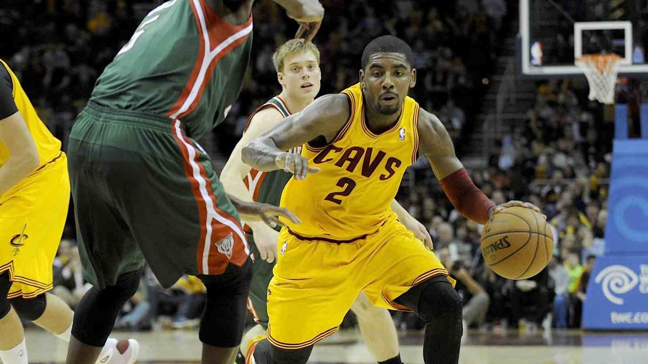 Irving scores 39, Cavs beat Bucks 114-111 in OT
